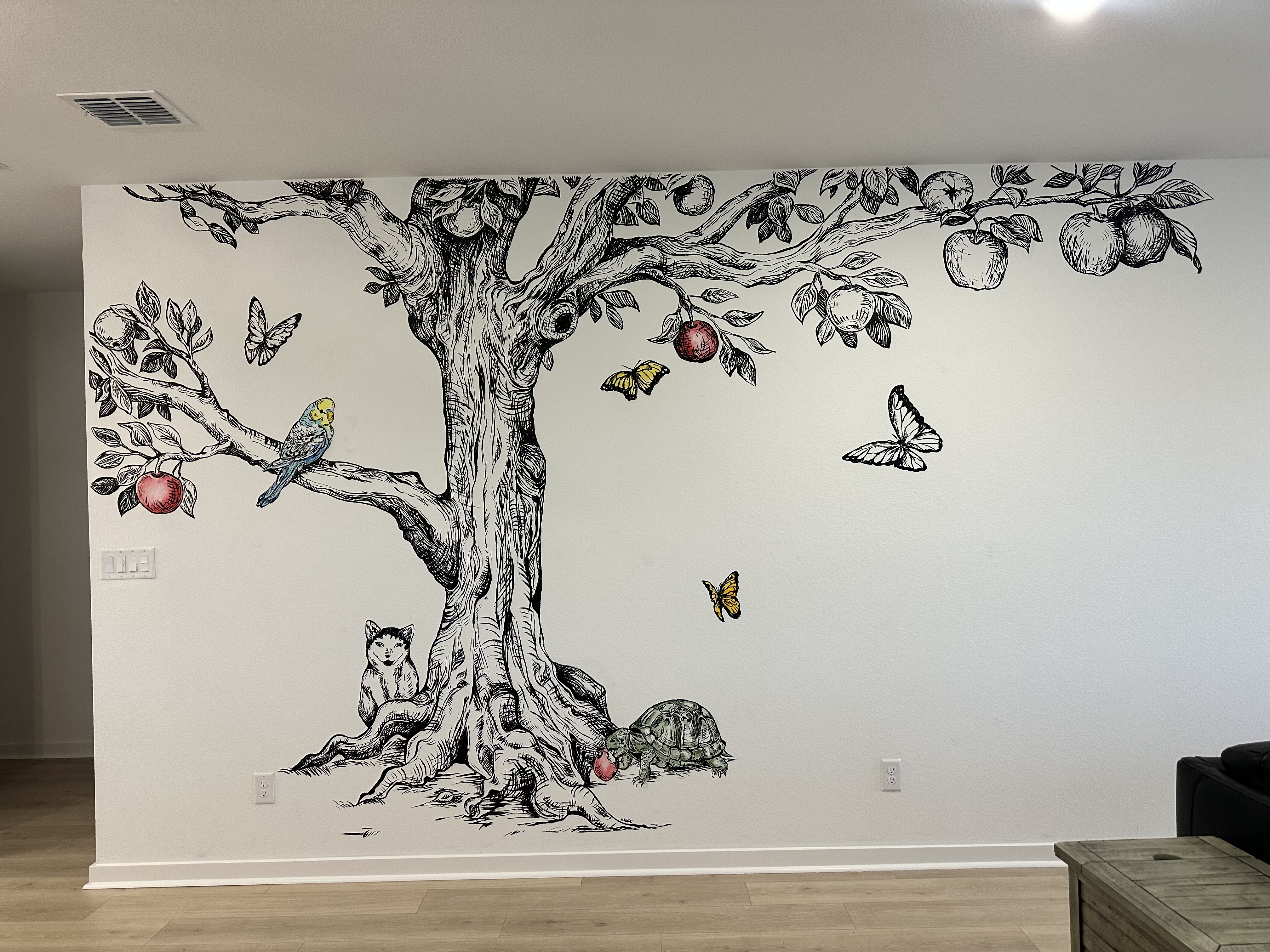 Storybook tree and tortoise living room mural in Buda near Austin