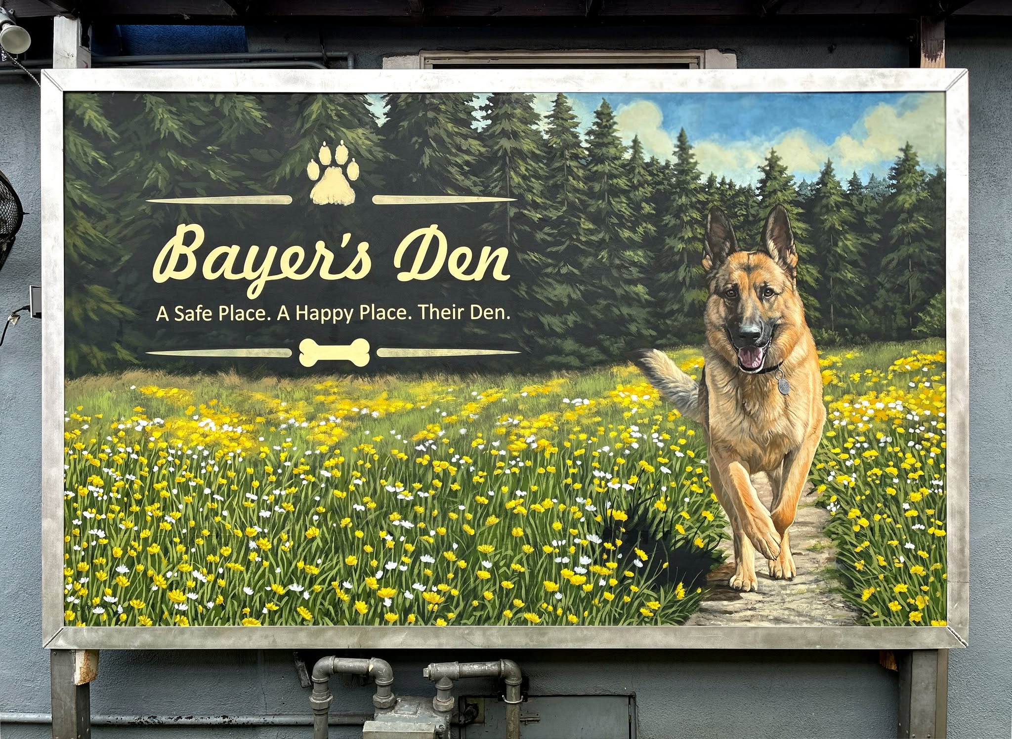 Forest and meadow mural panel with a German shepherd, painted by a Los Angeles muralist for a dog rescue